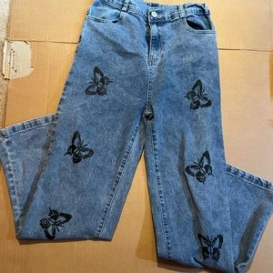 jeans with black butterflies with flared legs